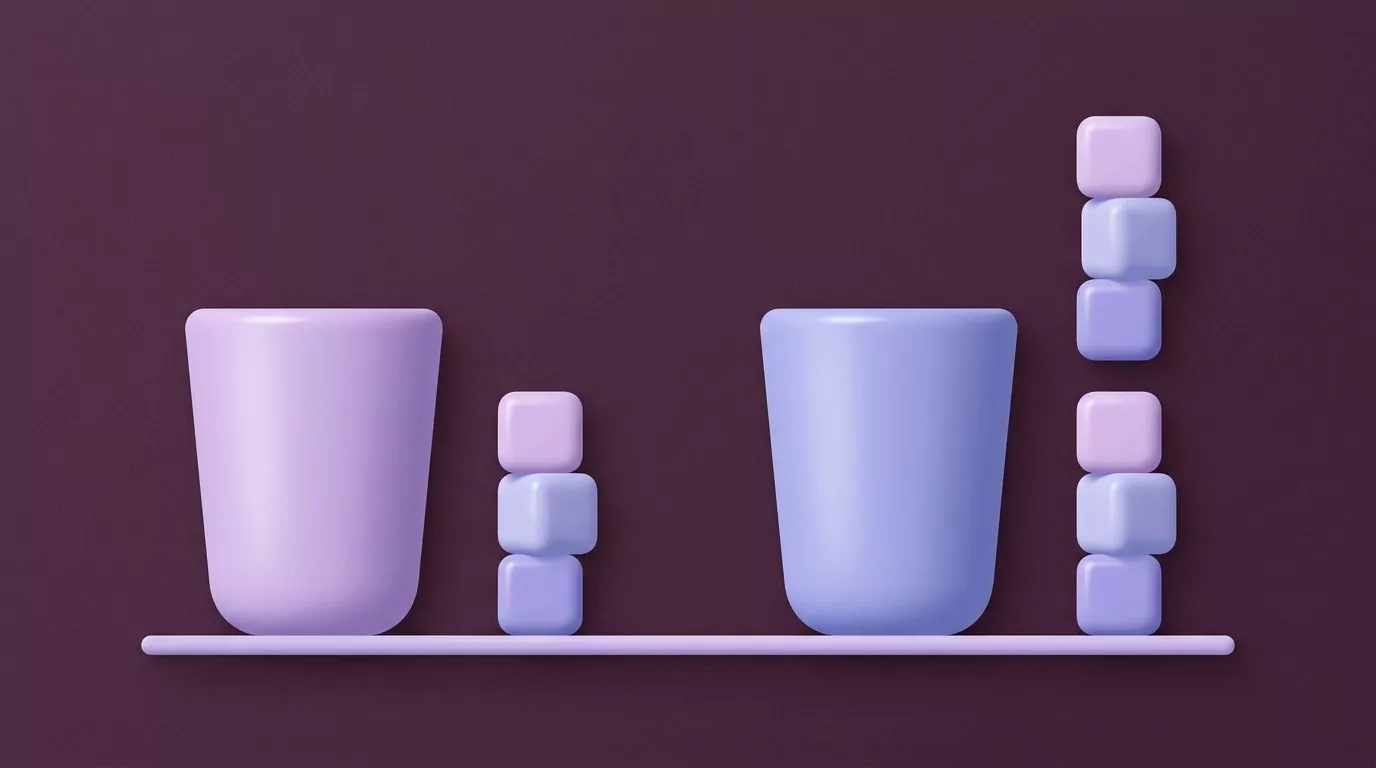 Plain milk glass with three sugar cubes beside a chocolate milk glass with six, doubling the stack