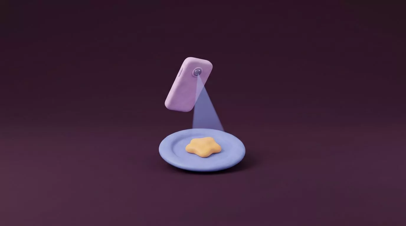 Clay-style phone photographing a plate, the idea behind a photo calorie counter