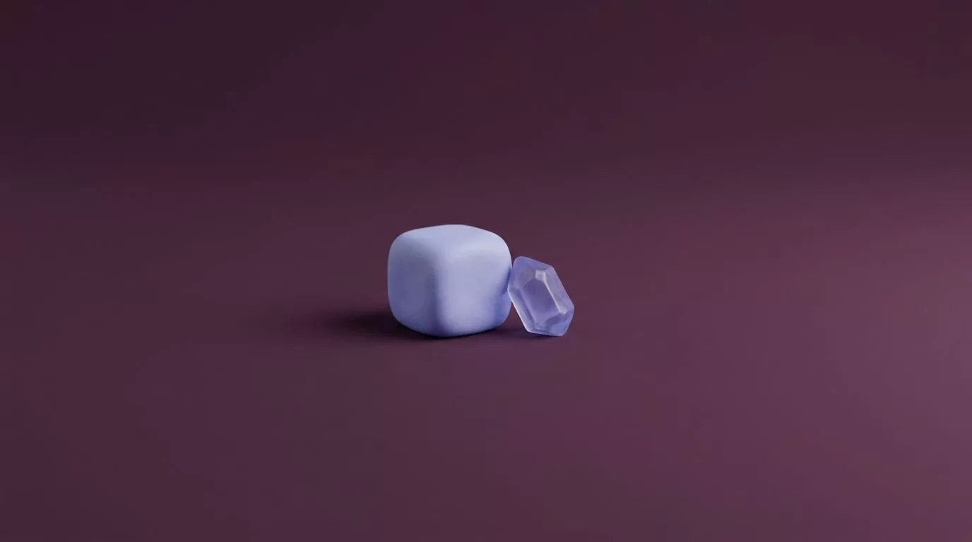 Clay sugar cube beside a crystal shard, a visual answer to what are sugar alcohols
